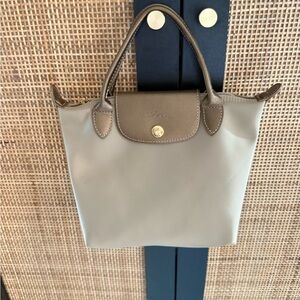 Longchamp gold colored handbag